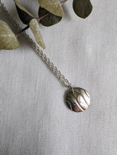 Load image into Gallery viewer, Silver Circle Pendant with Wave Design
