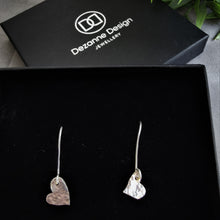 Load image into Gallery viewer, Small silver hearts with hammered texture set as drop earrings
