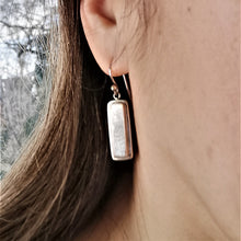 Load image into Gallery viewer, Long rectangular meteorite slice set in a double bezel silver setting as dangle and drop earring
