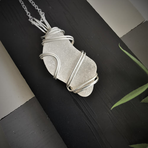 Long white seaglass pendant wrapped in silver wire