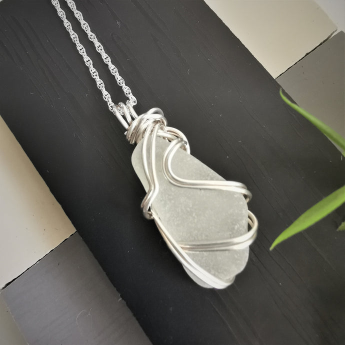 Long white seaglass pendant wrapped in silver wire