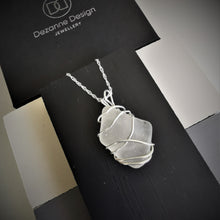 Load image into Gallery viewer, White seaglass pendant wrapped in silver wire
