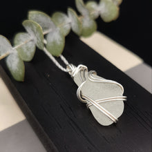 Load image into Gallery viewer, Long white seaglass pendant wrapped in silver wire
