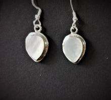 Load image into Gallery viewer, Mother of pearl teardrop dangle and drop earrings set in silver double bezel
