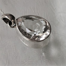 Load image into Gallery viewer, Faceted large teardrop clear crystal quartz pendant in thick band of solid silver
