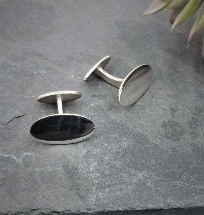 silver oval shape cufflinks with solid silver arms