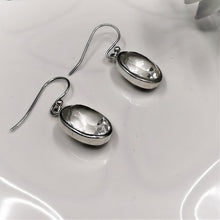 Load image into Gallery viewer, Faceted clear quartz crystal ovals set in solid silver as drop earrings 
