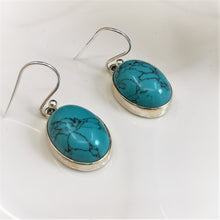 Load image into Gallery viewer, Marbled turquoise ovals set in silver dangle and drop earrings
