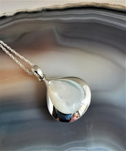 Load image into Gallery viewer, Polished mother of pearl teardrop set in a silver pendant on a rope chain 
