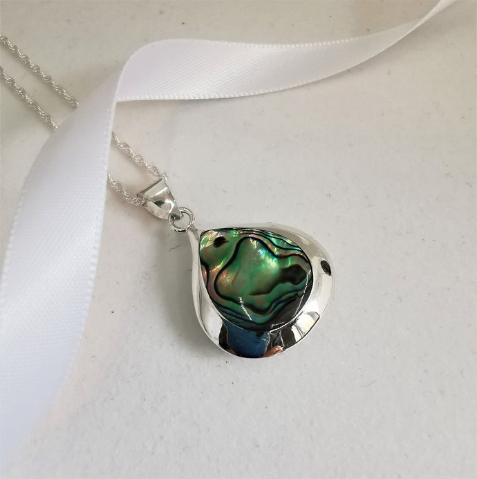 Paua shell set in teardrop solid silver double sided pendant