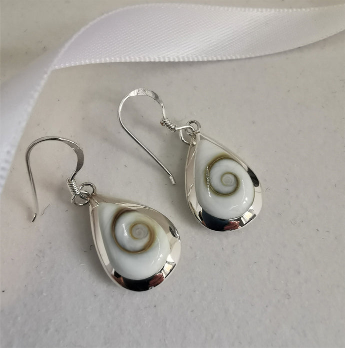 Shiva eye shell teardrops set in silver dangle and drop earrings