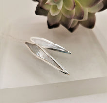 Load image into Gallery viewer, Two slices of mother of pearl set in silver pointed leaf pendant
