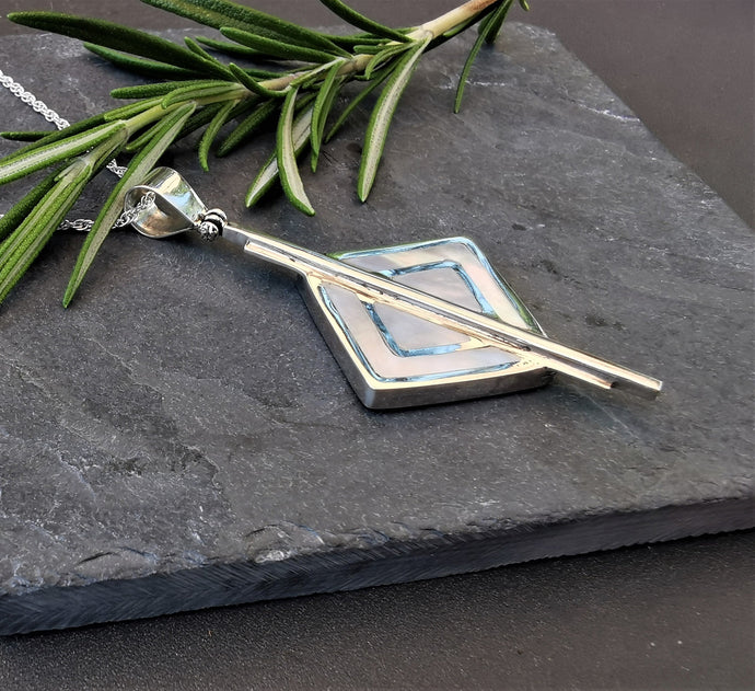 Mother of pearl and silver art deco style pendant in diamond shape